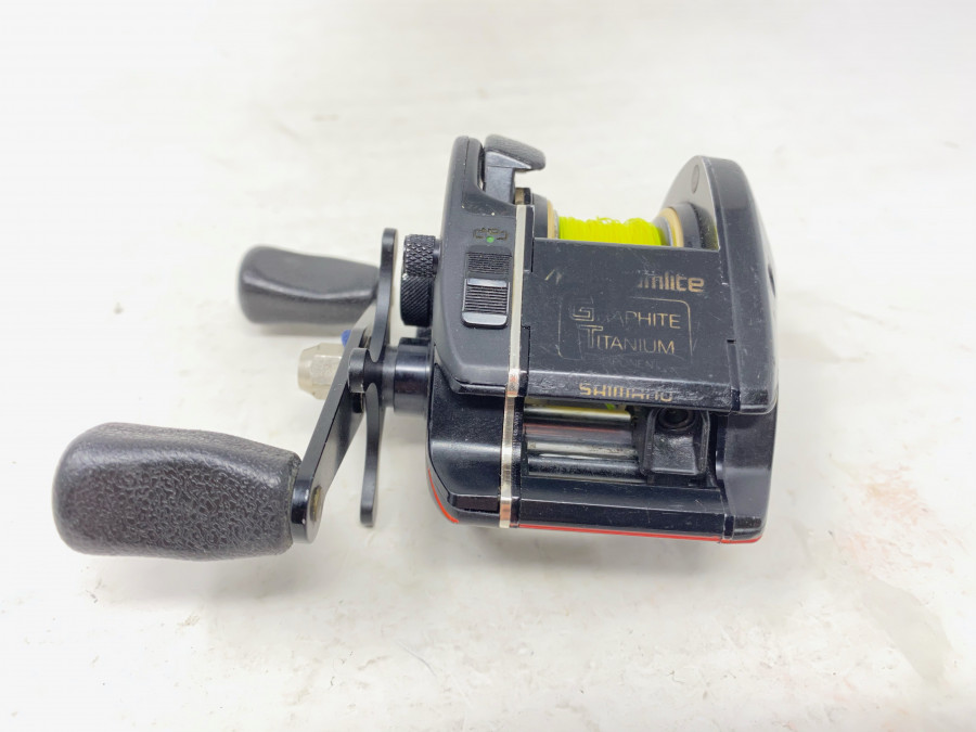 Multirolle, Shimano Bantam Magnumlite 2000, mit Schnur, Rechtshand, technisch in Ordnung, Gebrauchsspuren