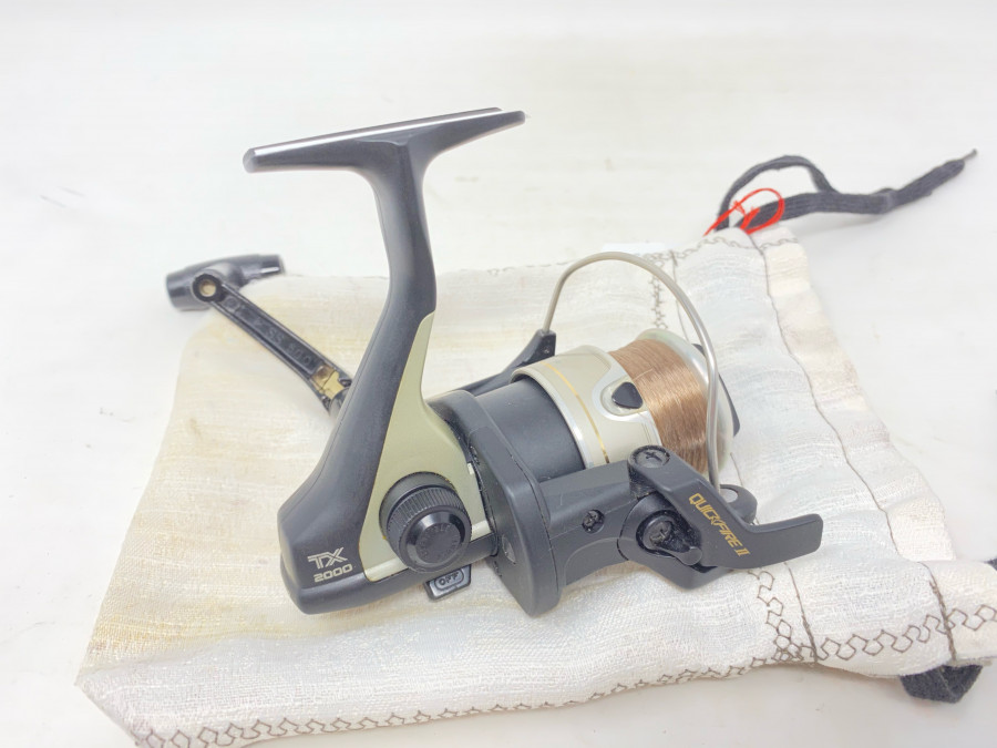 Stationärrolle, Shimano TX 2000 Quick Fire II, mit Schnur, neu und ungefischt