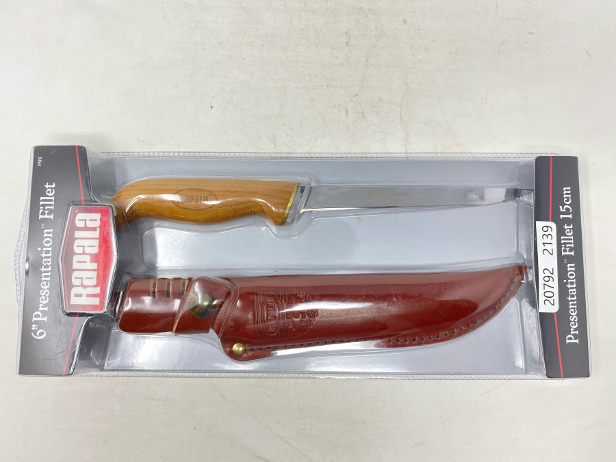 Rapala Presentation Filettiermesser, hergestellt von Marttiini, Finland, Griff gebackene Birke, Klingenlänge 15cm, geprägte Echtlederscheide mit Schnappverschluß, diese Qualität wird seit Jahren nicht mehr hergestellt, EK € 75,00 vor vielen Jahren neu