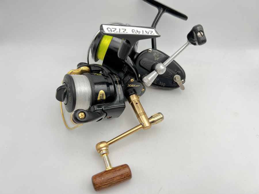 2 Stationärrollen, Mirtchell 308X gold und Mitchell 300, jeweils mit Schnur, Gebrauchsspuren