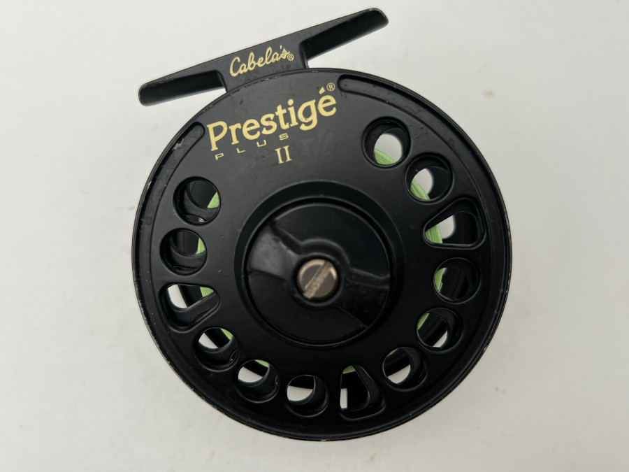 Fliegenrolle Cabelas Prestige Plus II, Linkshand, #6 - 7, Gewicht 190 Gramm, mit Backing, Gebrauchsspuren